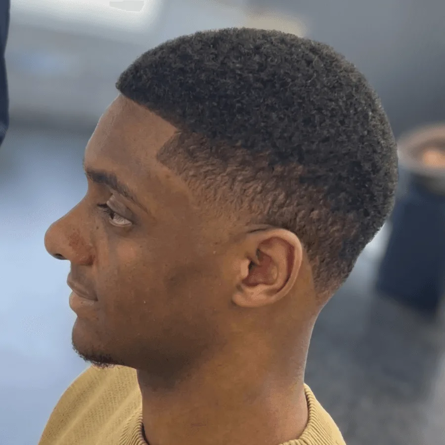 Mid fade haircut by Richard Lam, Toronto barber