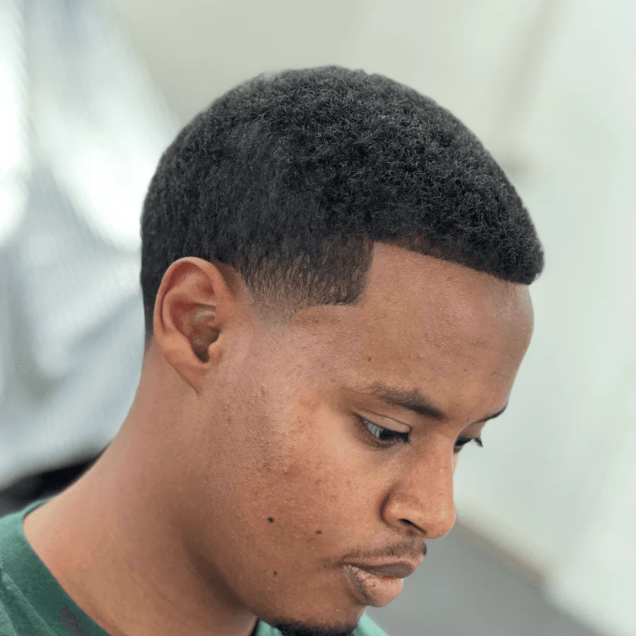 Low taper haircut by Richard Lam, Toronto barber