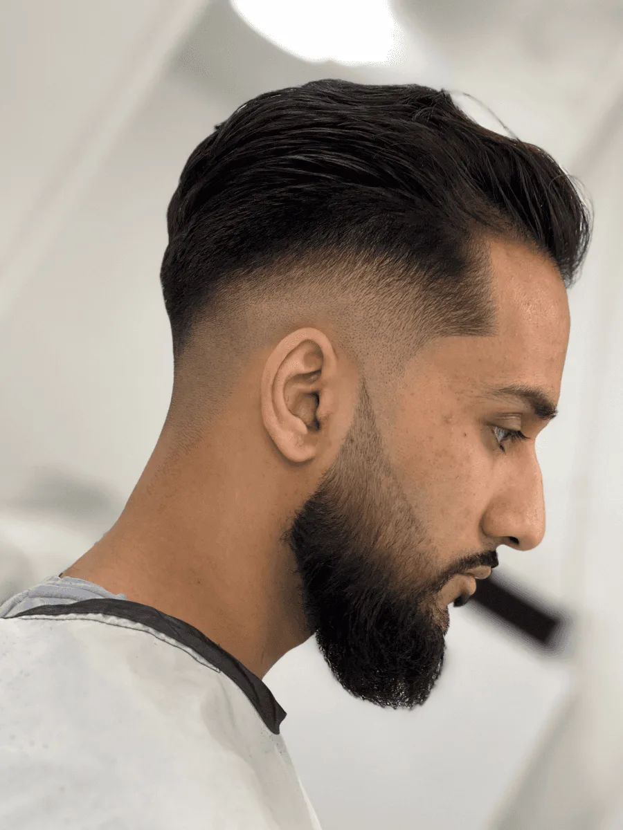 Mid fade haircut by Richard Lam, Toronto barber