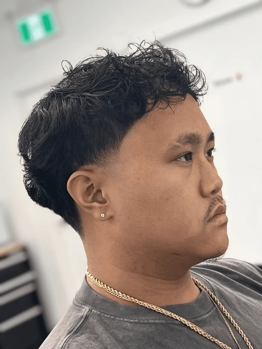 Low taper haircut by Richard Lam, Toronto barber