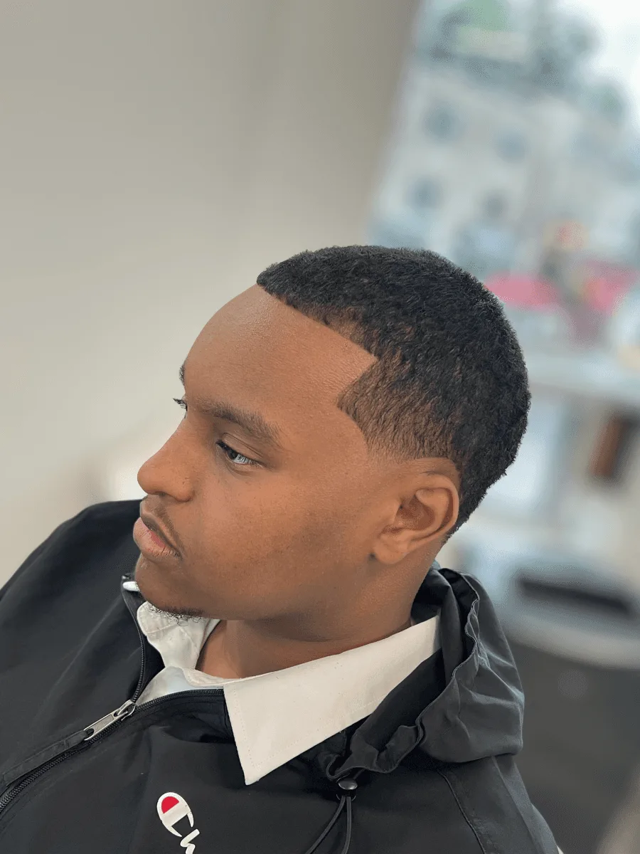 Low taper haircut by Richard Lam, Toronto barber