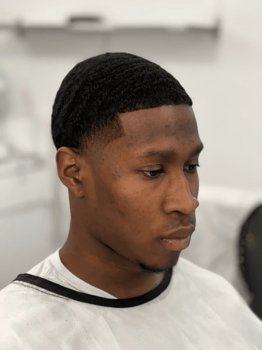 Mid taper haircut by Richard Lam, Toronto barber
