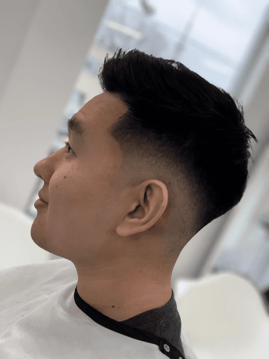 Mid fade haircut by Richard Lam, Toronto barber