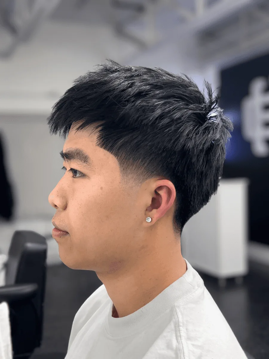 Low taper haircut by Richard Lam, Toronto barber