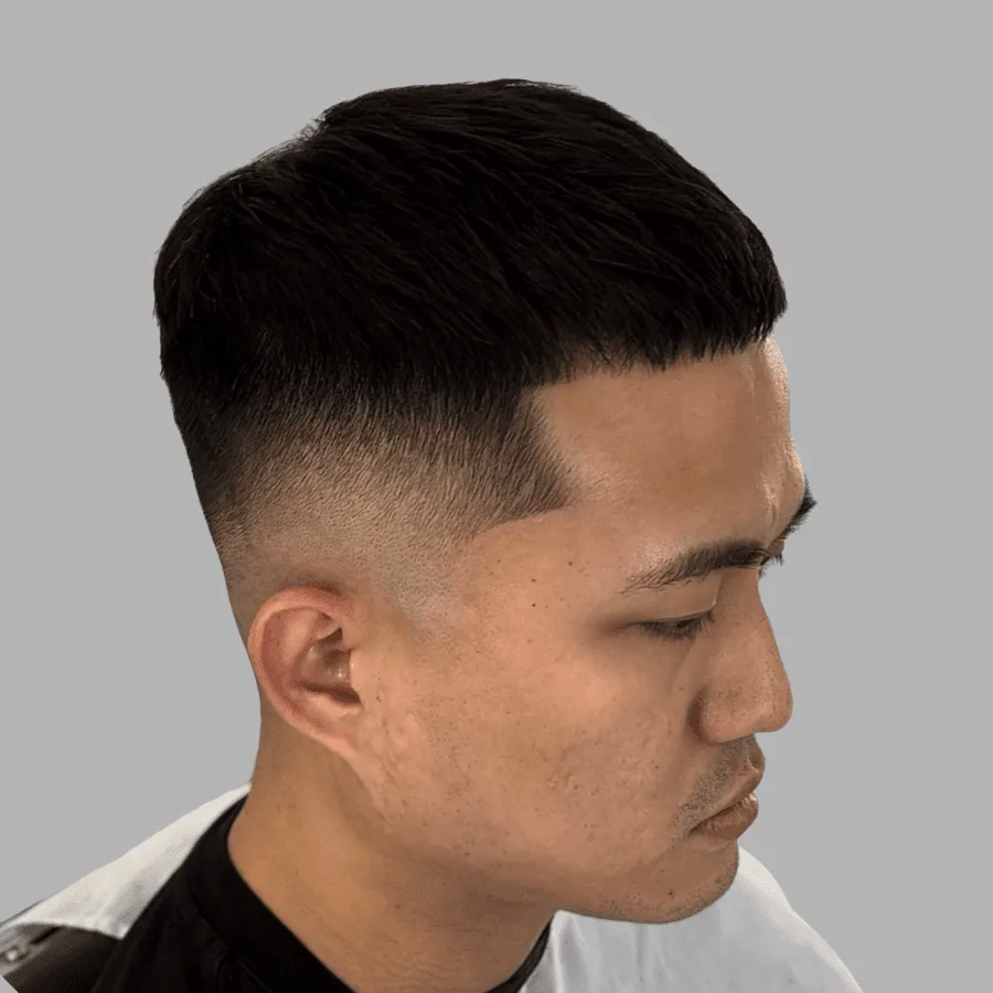 Mid fade haircut by Richard Lam, Toronto barber