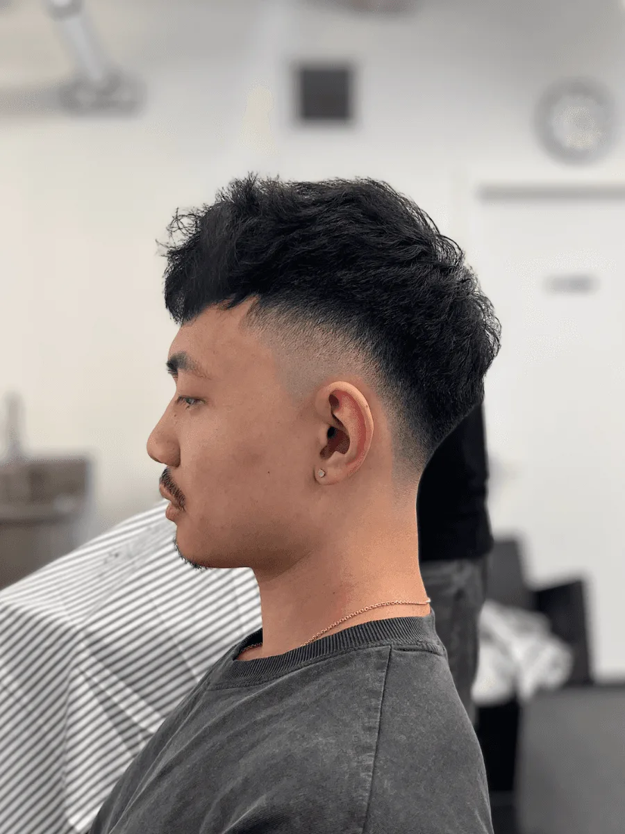 Mid fade haircut by Richard Lam, Toronto barber