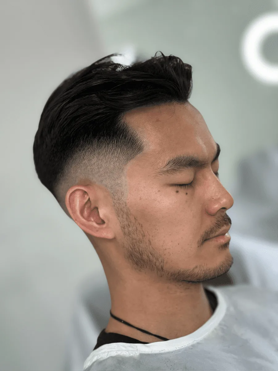 Mid fade haircut by Richard Lam, Toronto barber