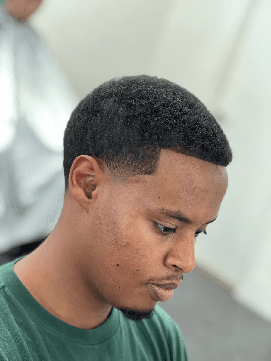 Low taper haircut by Richard Lam, Toronto barber