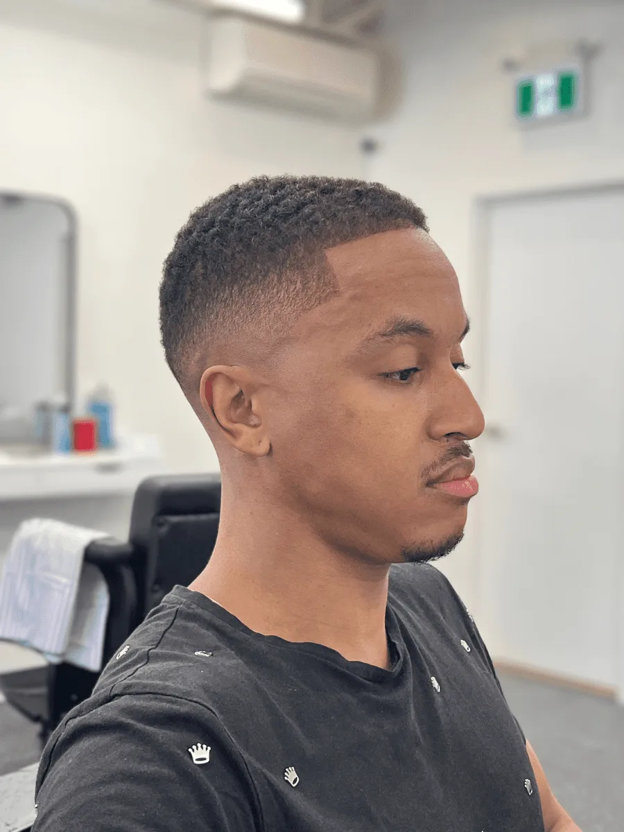 Mid fade haircut by Richard Lam, Toronto barber