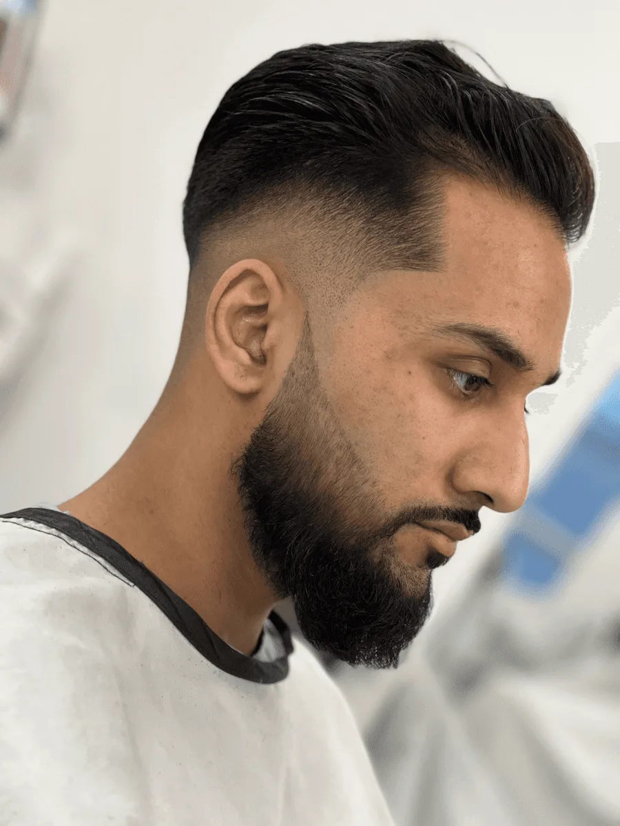 Faded beard trim by Richard Lam, Toronto barber