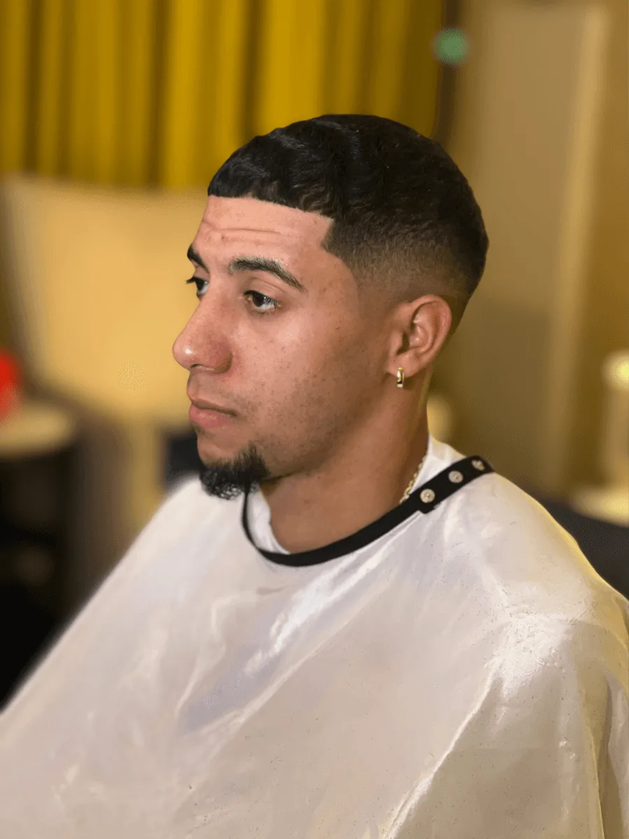 Mid fade haircut by Richard Lam, Toronto barber