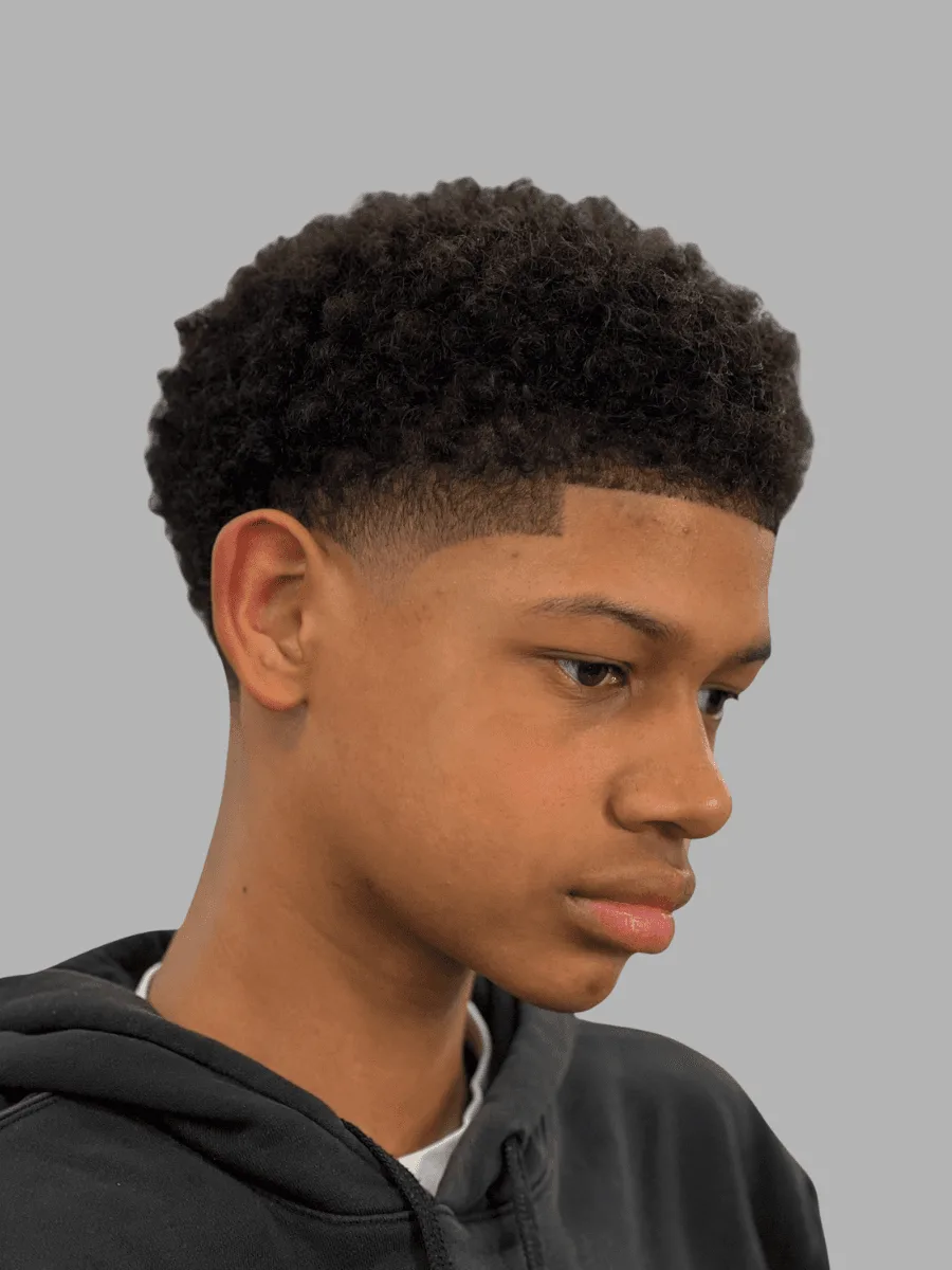 Mid taper haircut by Richard Lam, Toronto barber