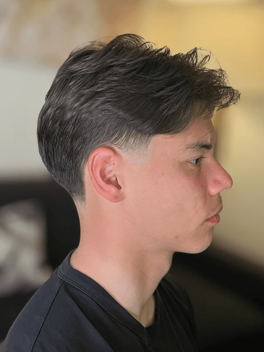 Low taper haircut by Richard Lam, Toronto barber